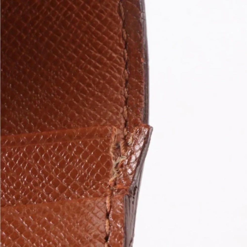 Louis Vuitton Porte Monnaie Wallet in Monogram Canvas